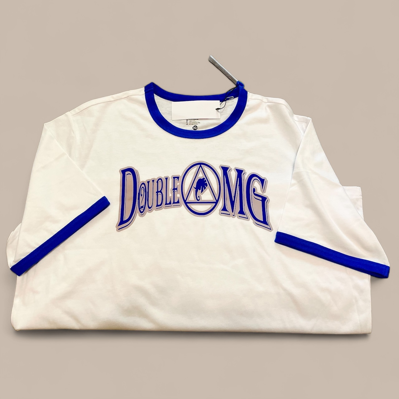 A white shirt with blue trim and the words " double omg ".