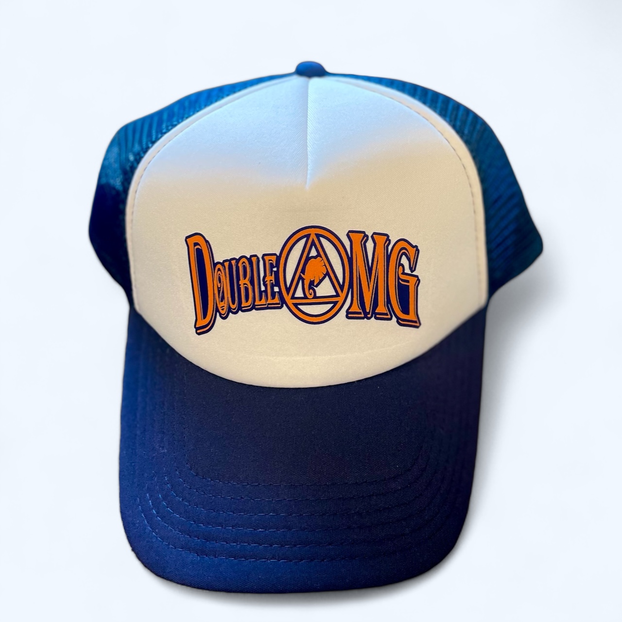 A blue and white hat with the words " duke of omg ".